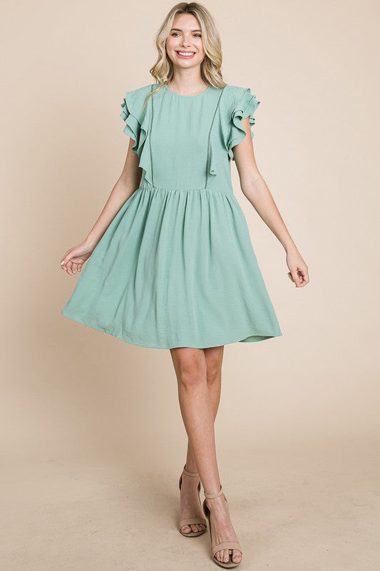 Style 1008 Sage Ruffle Front Dress- color in the picture looks different